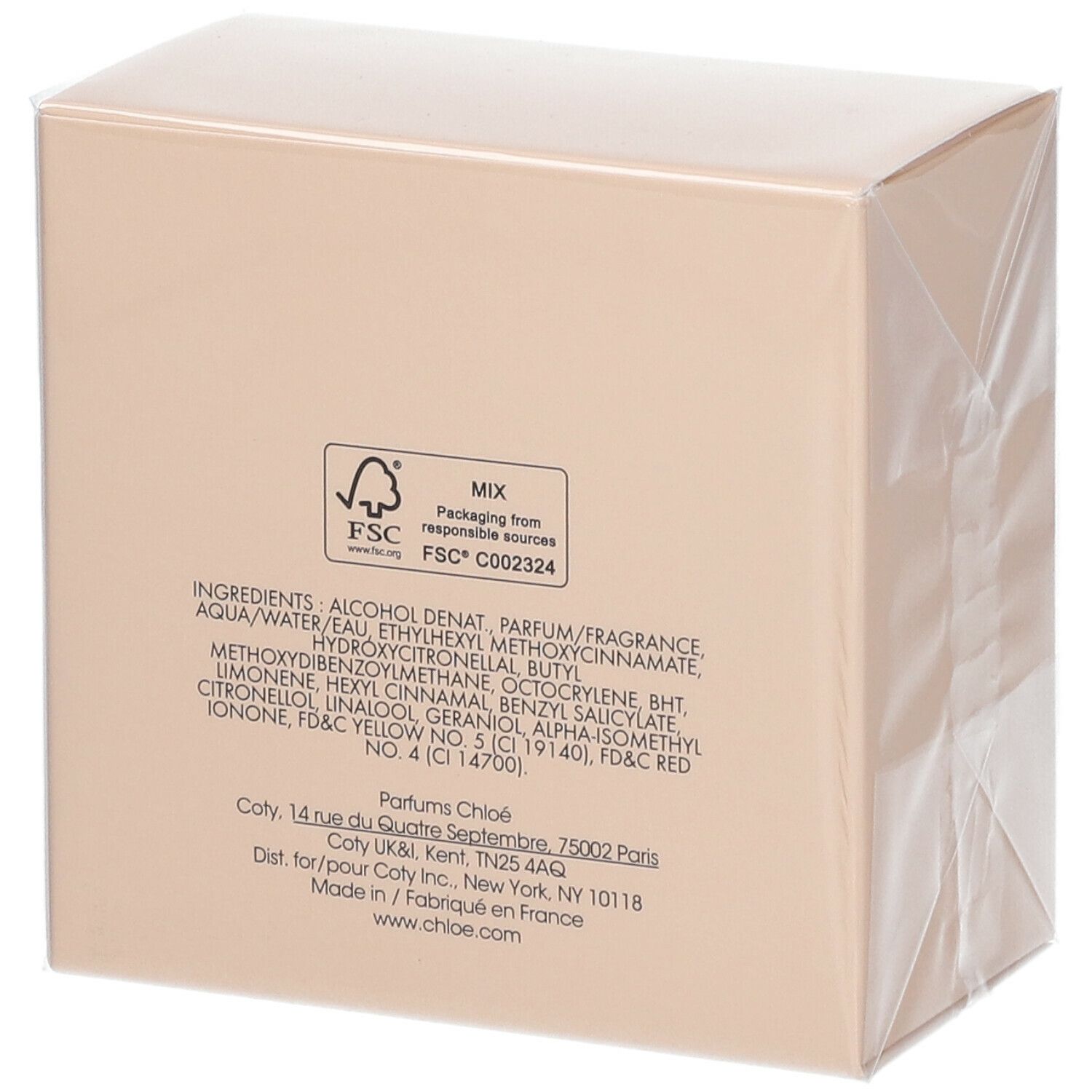 Retro di una scatola Chloé beige. Elenco ingredienti, certificazione FSC, indirizzo produttore e sito web.