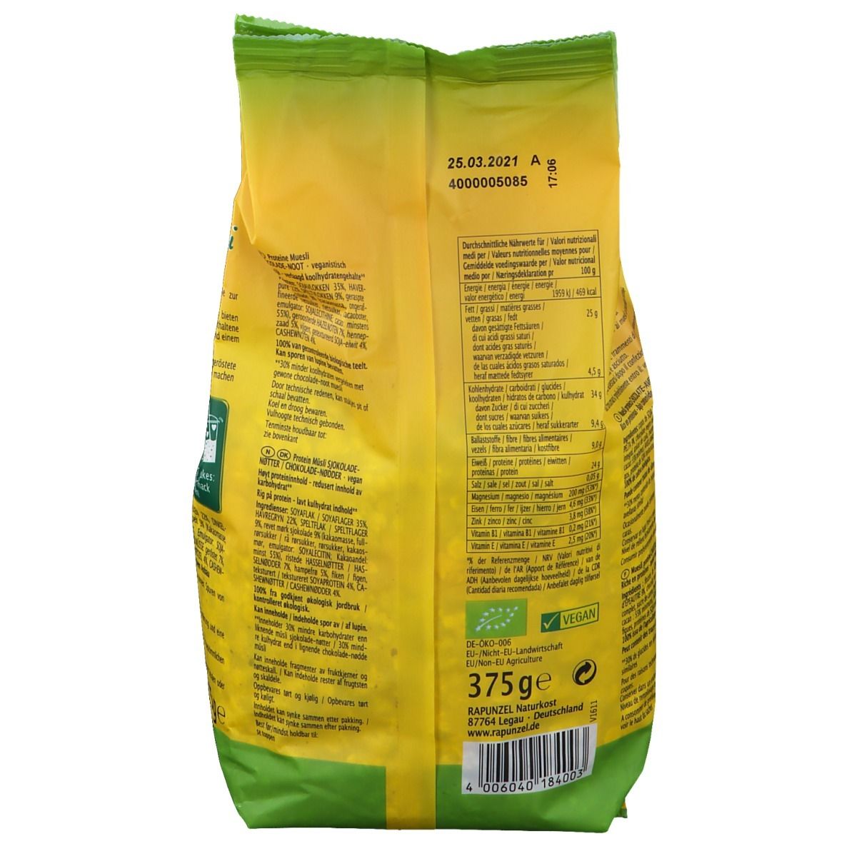 Retro della confezione di Rapunzel Protein Müsli. Contiene informazioni nutrizionali, elenco ingredienti e sigillo biologico. 375g. Sigillo vegano.