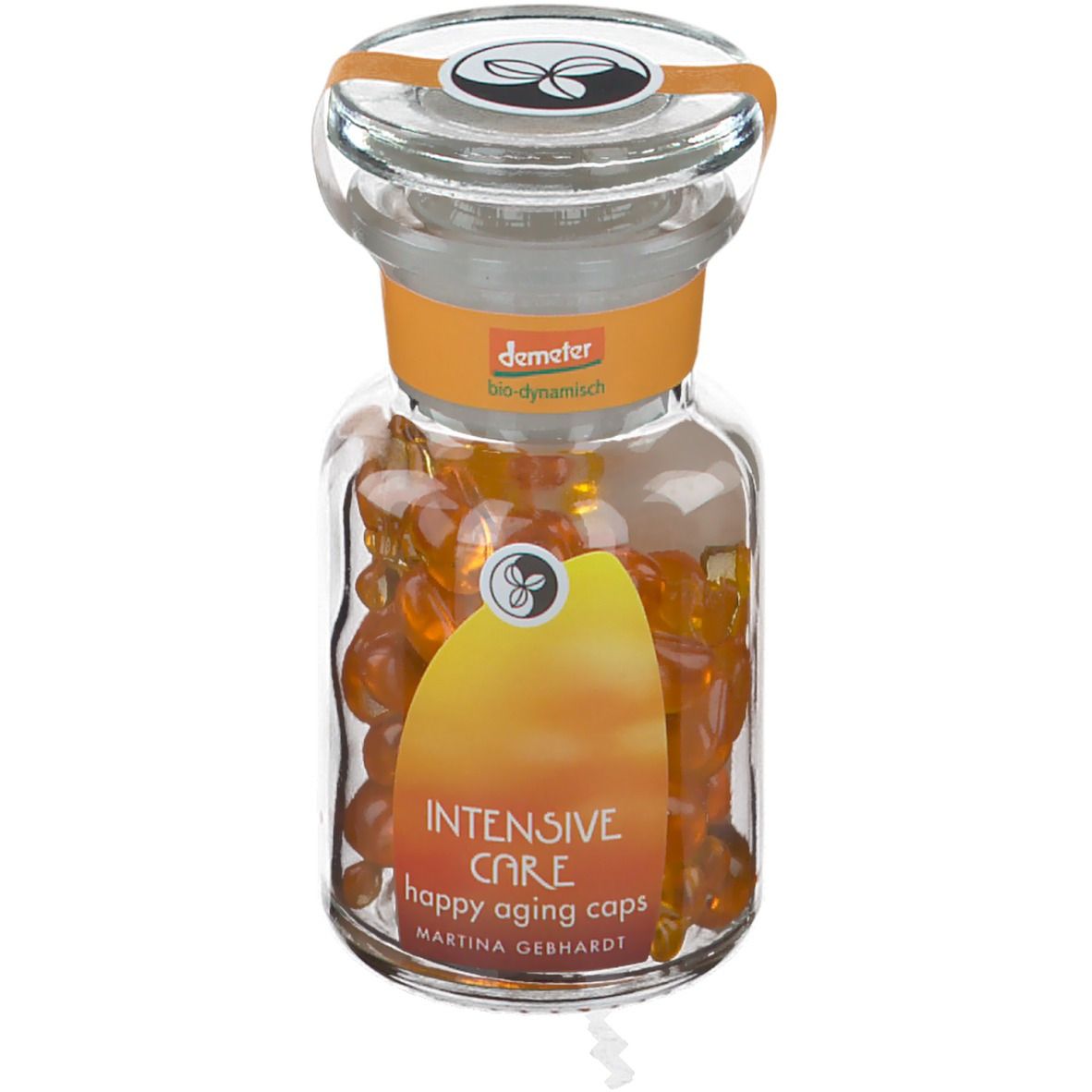 Flacone in vetro con capsule arancioni. Etichetta "Intensive Care" e "happy aging caps". Sigillo Demeter.