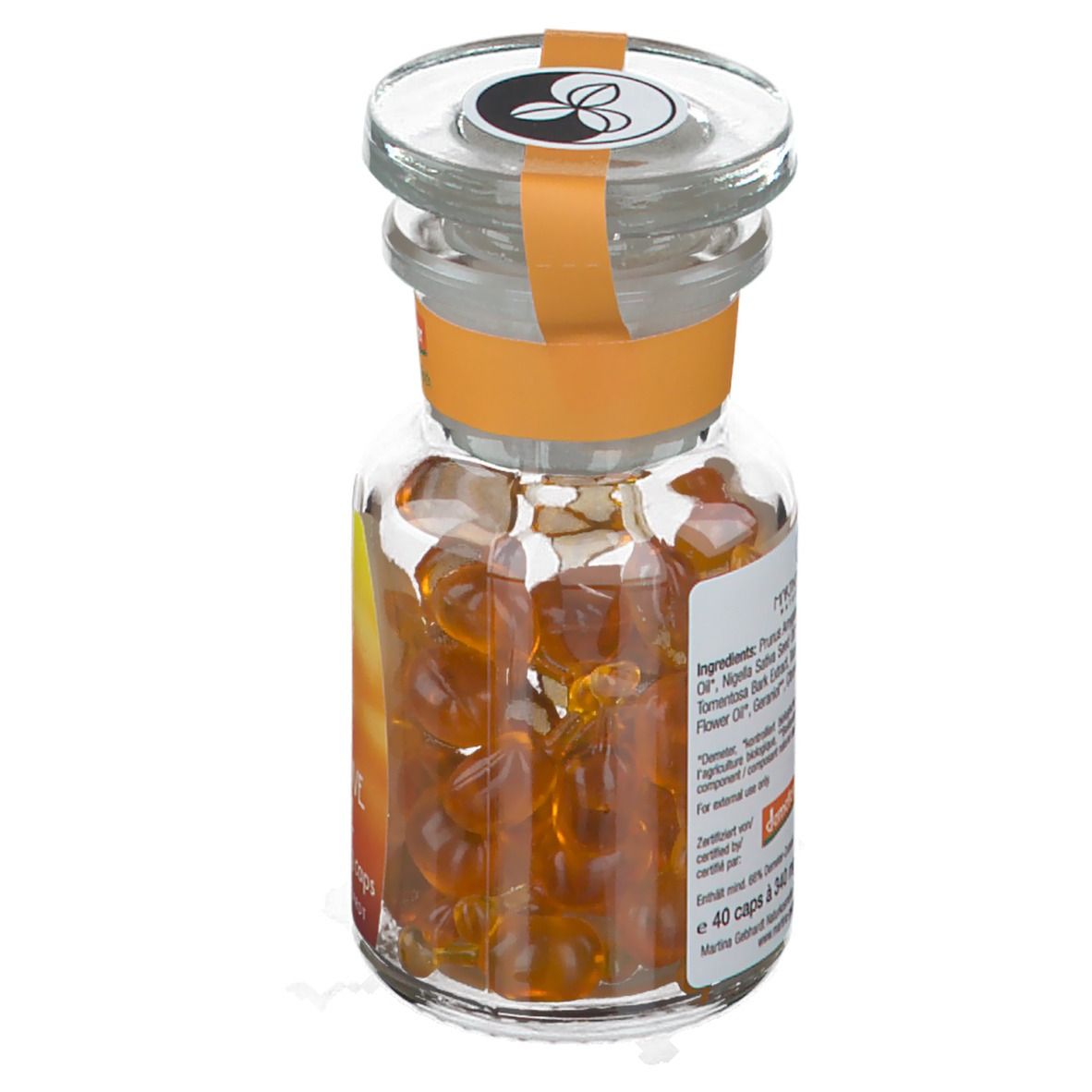 Flacone in vetro con capsule arancioni. Retro con elenco ingredienti e informazioni. Sigillo Demeter.