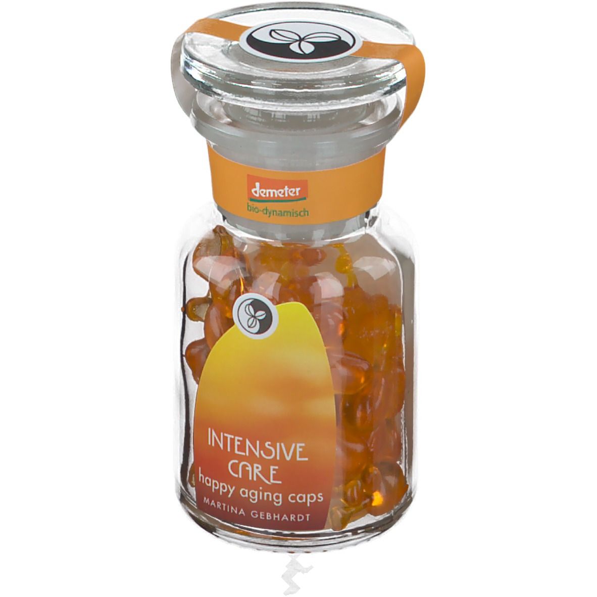Flacone in vetro con capsule arancioni. Etichetta "Intensive Care" e "happy aging caps". Sigillo Demeter.