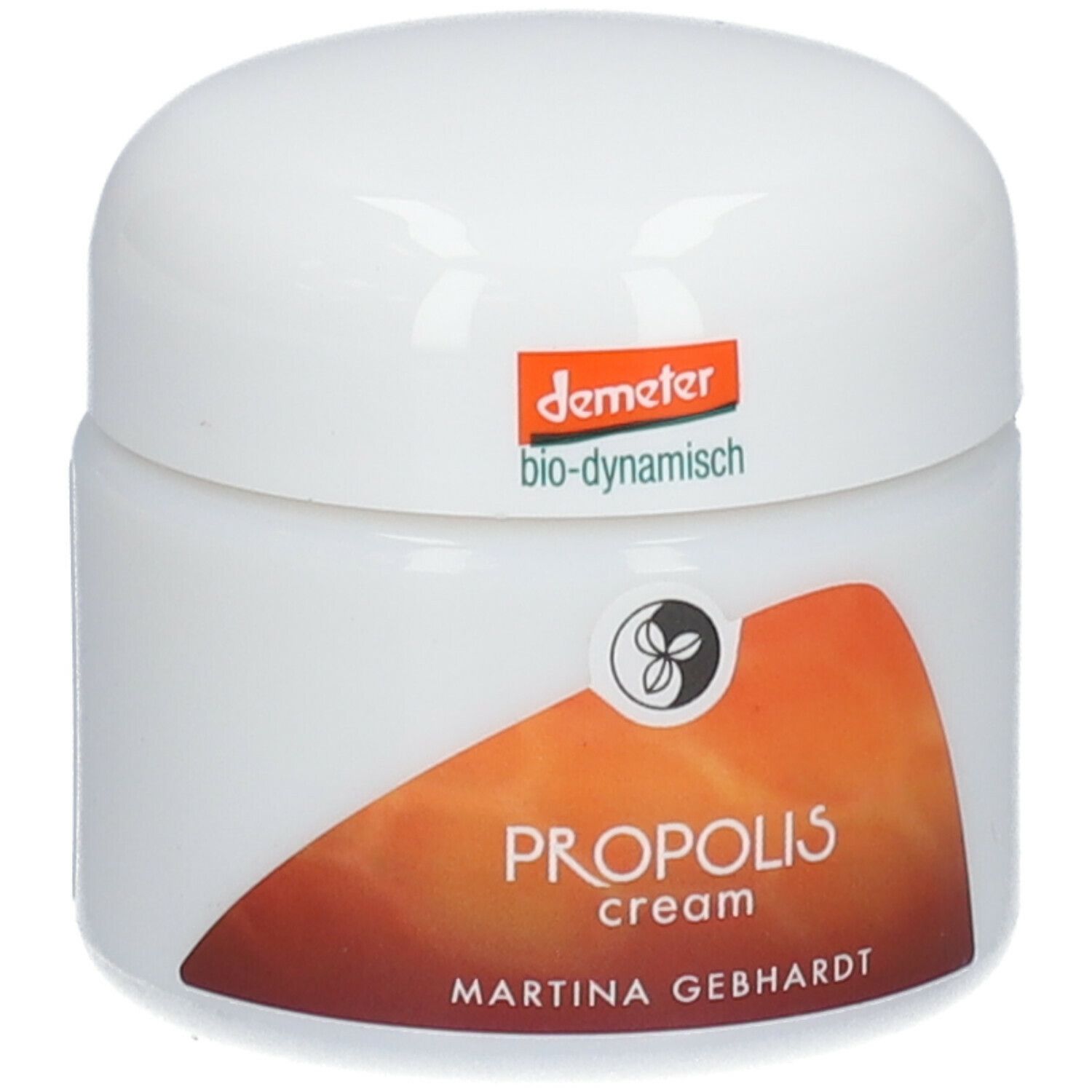 Vasetto di crema con coperchio. Scritta: PROPOLIS cream, MARTINA GEBHARDT. Logo e marchio Demeter.