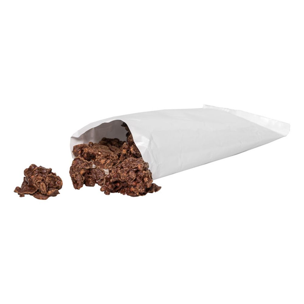 Busta bianca aperta con Protein Crossies. Alcuni Crossies sono accanto.