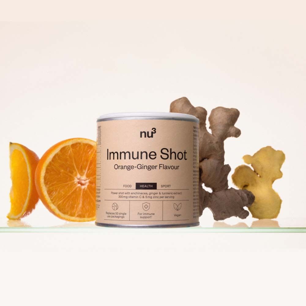 Barattolo con arancia, zenzero. Scritta: nu3 Immune Shot Orange-Ginger Flavour. Contiene vitamina C e zinco.