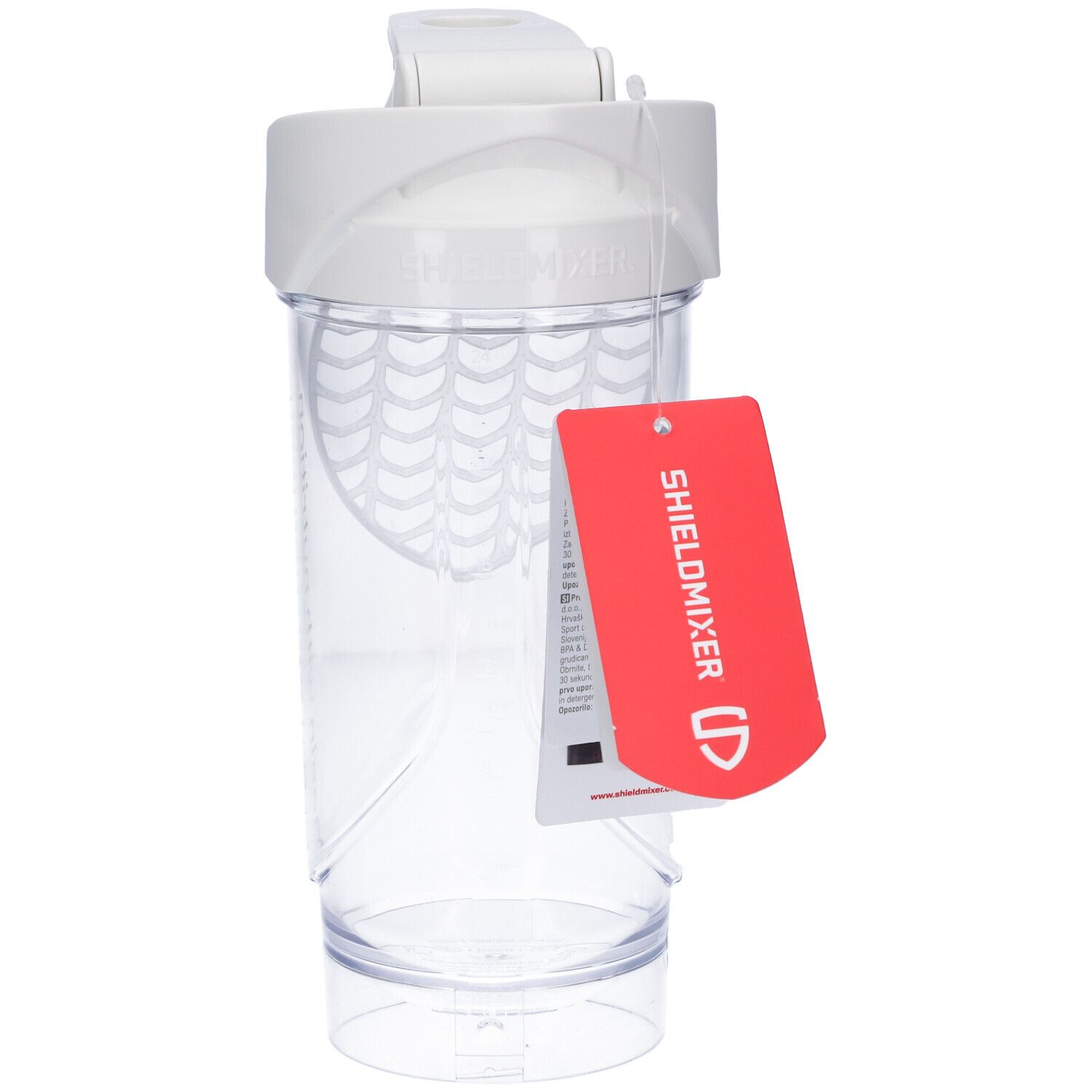 Shaker bianco con coperchio bianco. Contenitore trasparente. Etichetta rossa con testo. Senza sfera miscelatrice.