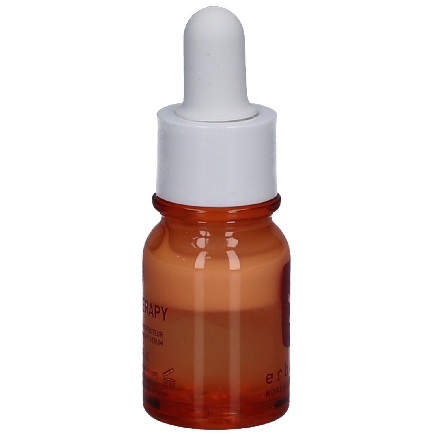 Flacone di vetro marrone con contagocce bianco. Logo rosso e scritta sul flacone. Contiene un liquido arancione.