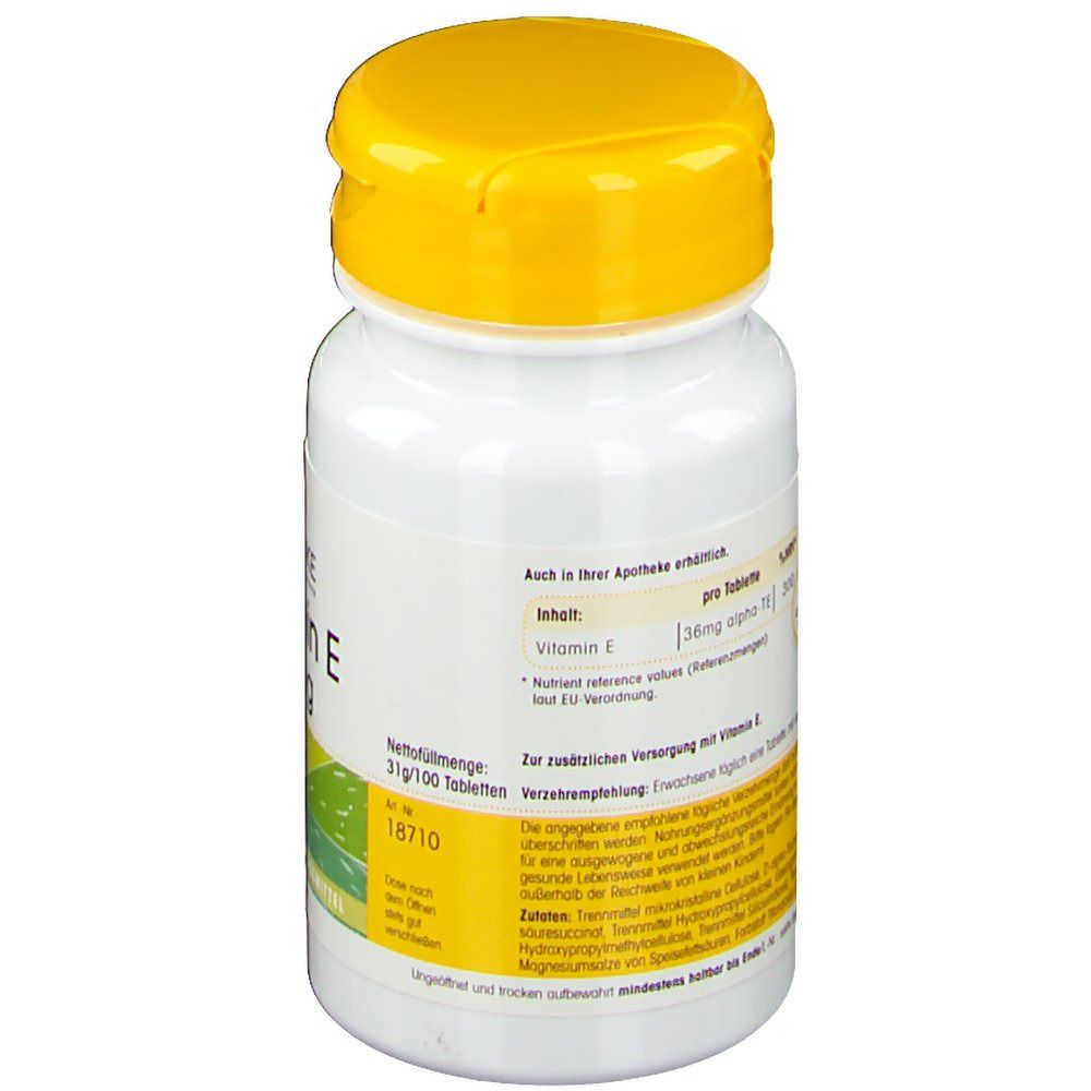 Retro del flacone bianco con tappo giallo. Informazioni testuali. Scritta: Vitamina E, 36mg. 100 compresse. Integratore alimentare.