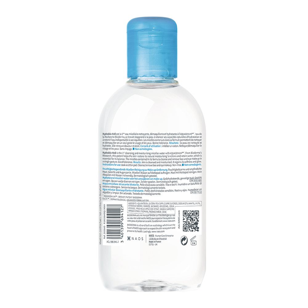 Flacone in plastica trasparente con tappo a scatto blu, retro con etichetta e codice a barre.