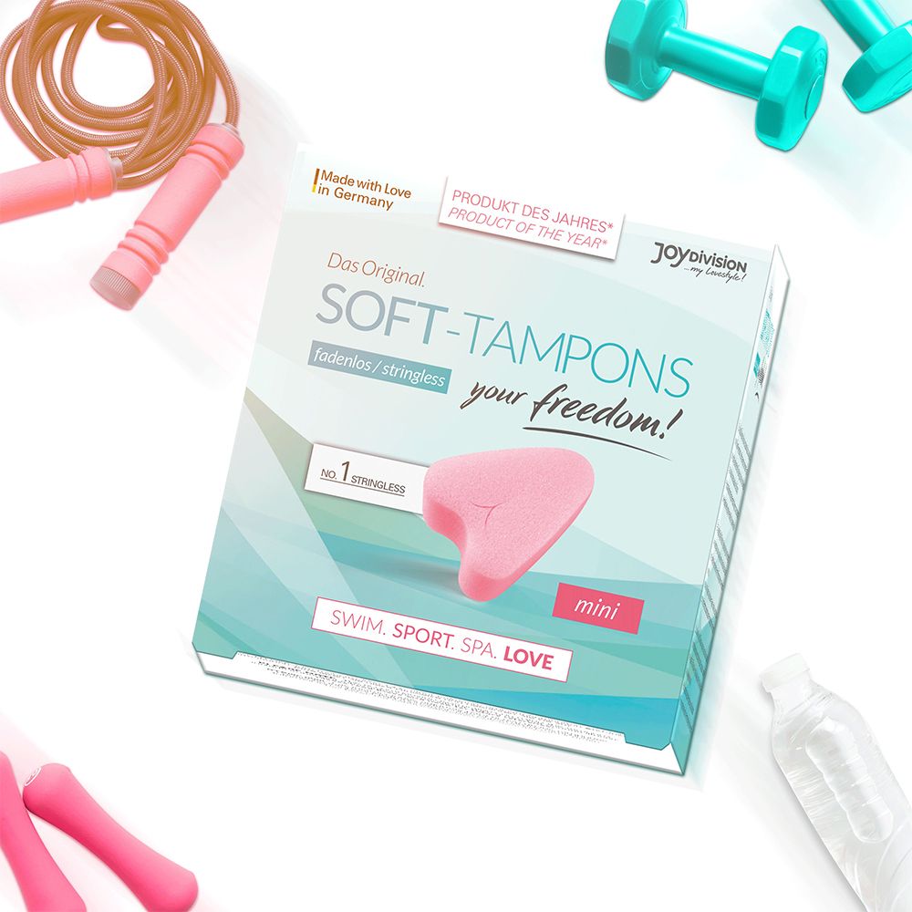 Immagine del prodotto con confezione Soft-Tampons mini. Tampone rosa raffigurato. Testo: fadenlos/stringless, SWIM. SPORT. SPA. LOVE.