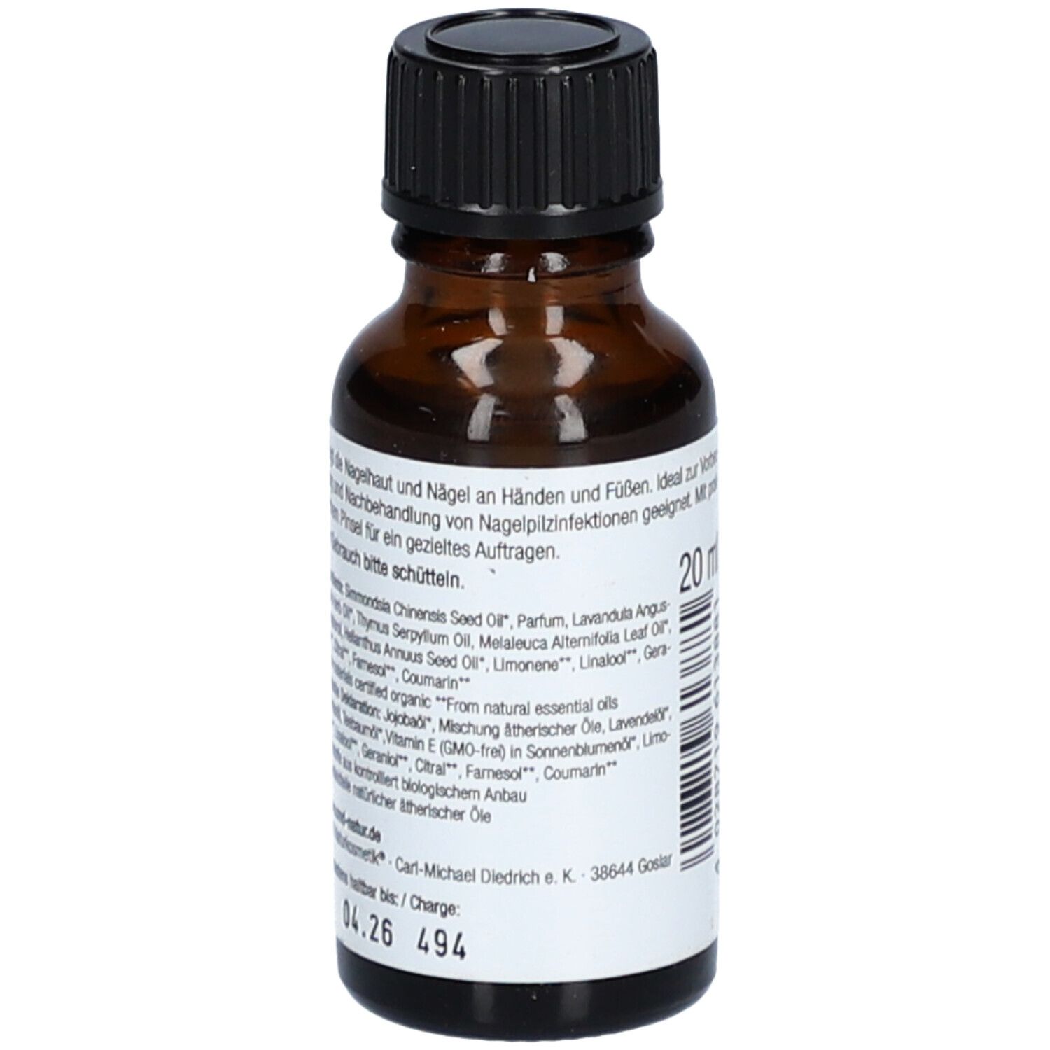 Flacone di vetro marrone con tappo nero. Etichetta con ingredienti e CMD Naturkosmetik. 20 ml. Da consumarsi preferibilmente entro 04.26.