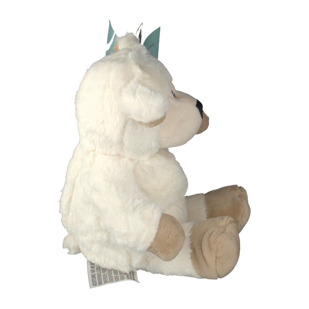 Pecora di peluche beige di lato. Etichetta sull'orecchio. Vista laterale del prodotto.