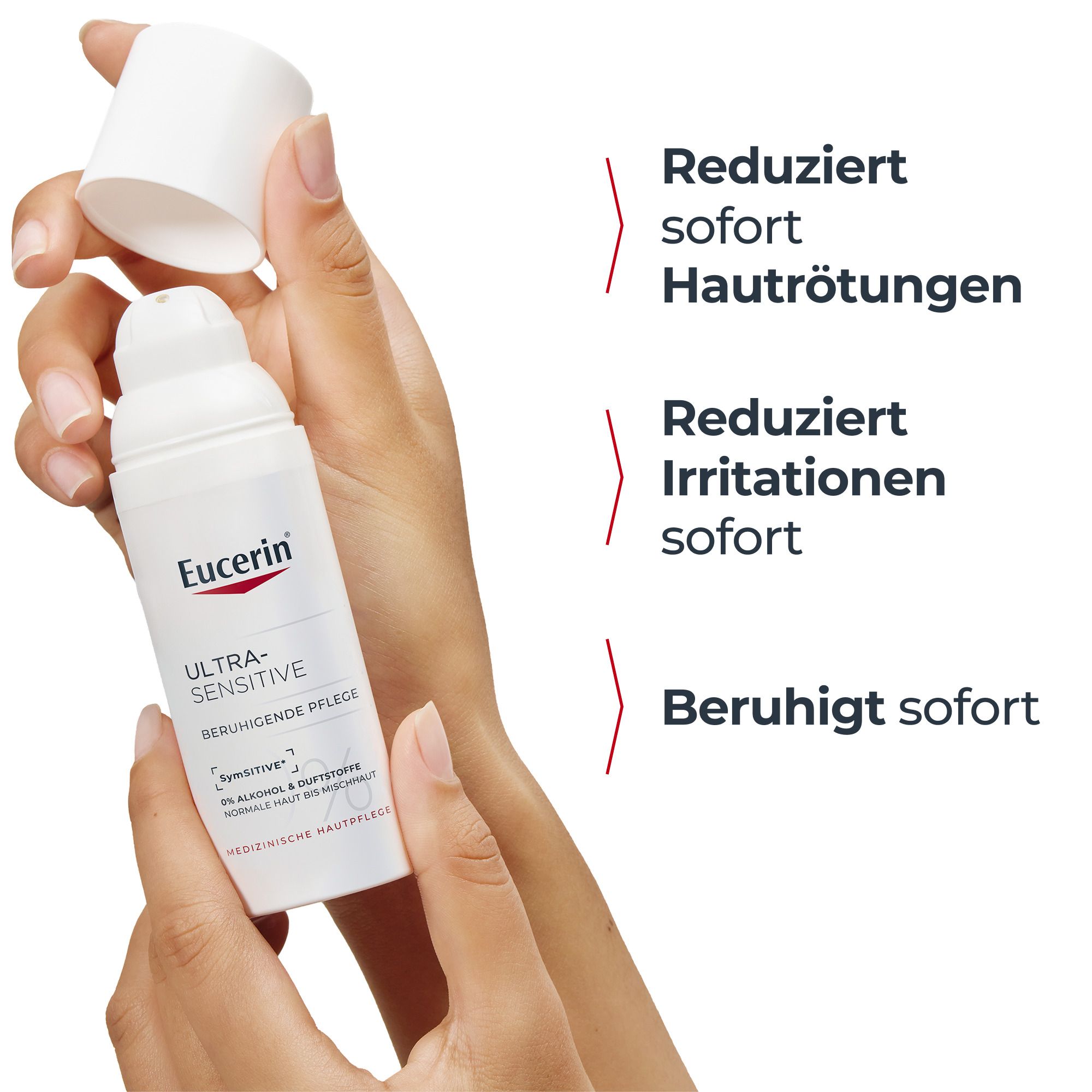 Mani che tengono il flacone Eucerin UltraSensitive Cura Lenitiva. Riduce rossori e irritazioni.