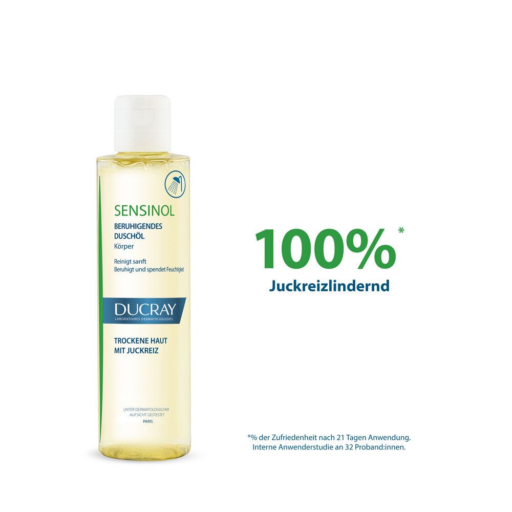 Ducray Sensinol Olio doccia lenitivo per il corpo. Liquido limpido in flacone trasparente con tappo bianco.