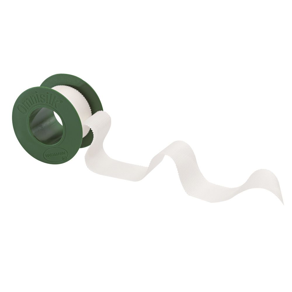 Hartmann Omnisilk®. Rotolo bianco con anima verde. Nastro adesivo srotolato.