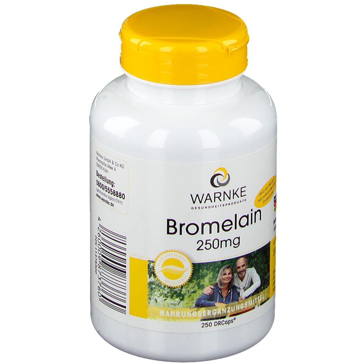 Flacone bianco con tappo giallo. Scritta: Warnke Bromelain 250mg. Contiene 250 DRcaps. Con foto di coppia.