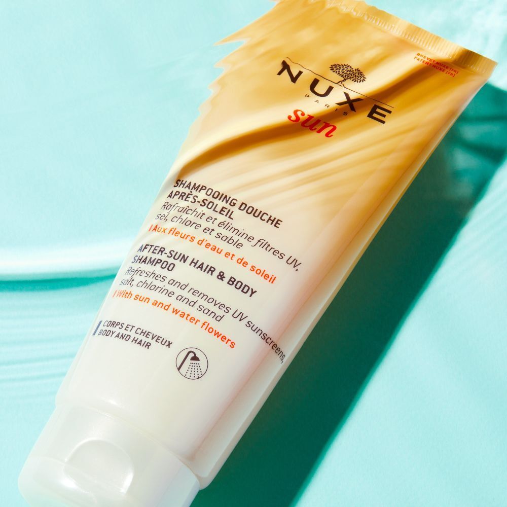 Tubo dorato Nuxe Sun Shampoo Doposole per capelli e corpo, con tappo bianco.
