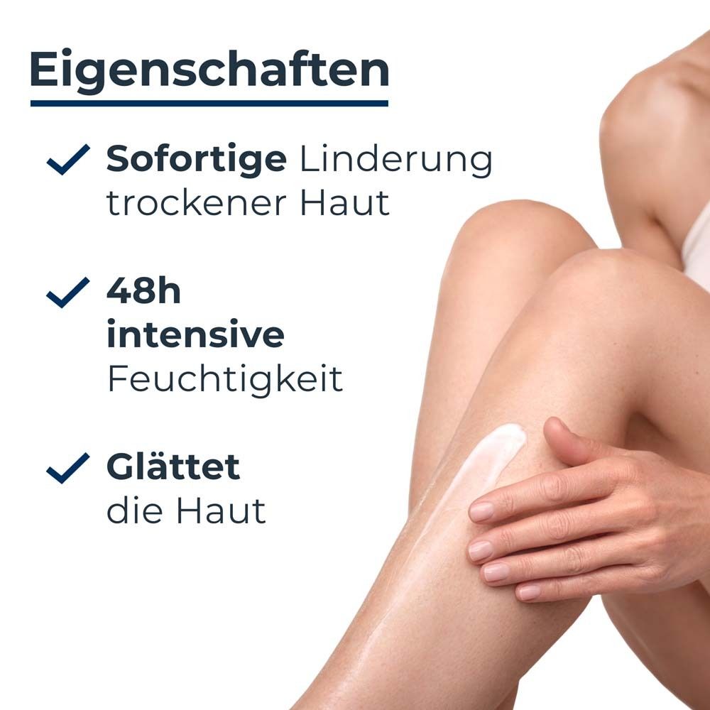 Eucerin UreaRepair PLUS Crema Idratante 5% Urea, vaso da 450ml tenuto in mano.