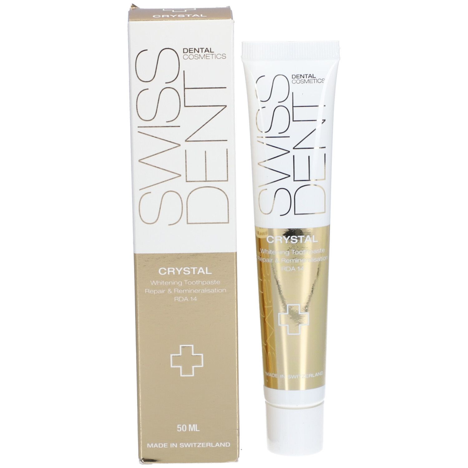 Tubo e scatola di dentifricio. Tubo: bianco/oro, SWISS DENT, CRYSTAL. Scatola: bianco/oro, SWISS DENT, CRYSTAL, 50 ml.