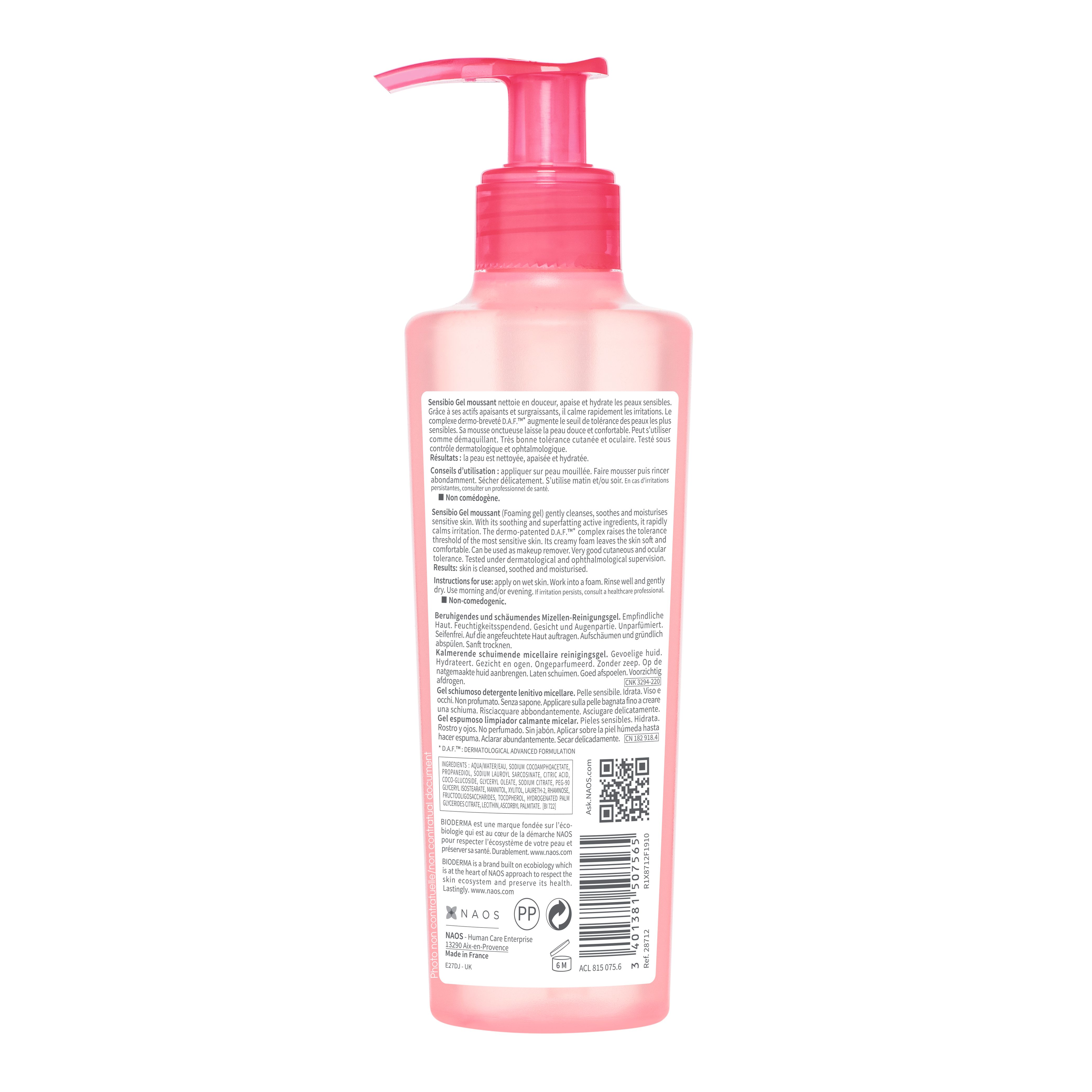 Flacone spray rosa con etichetta che descrive ingredienti e uso.