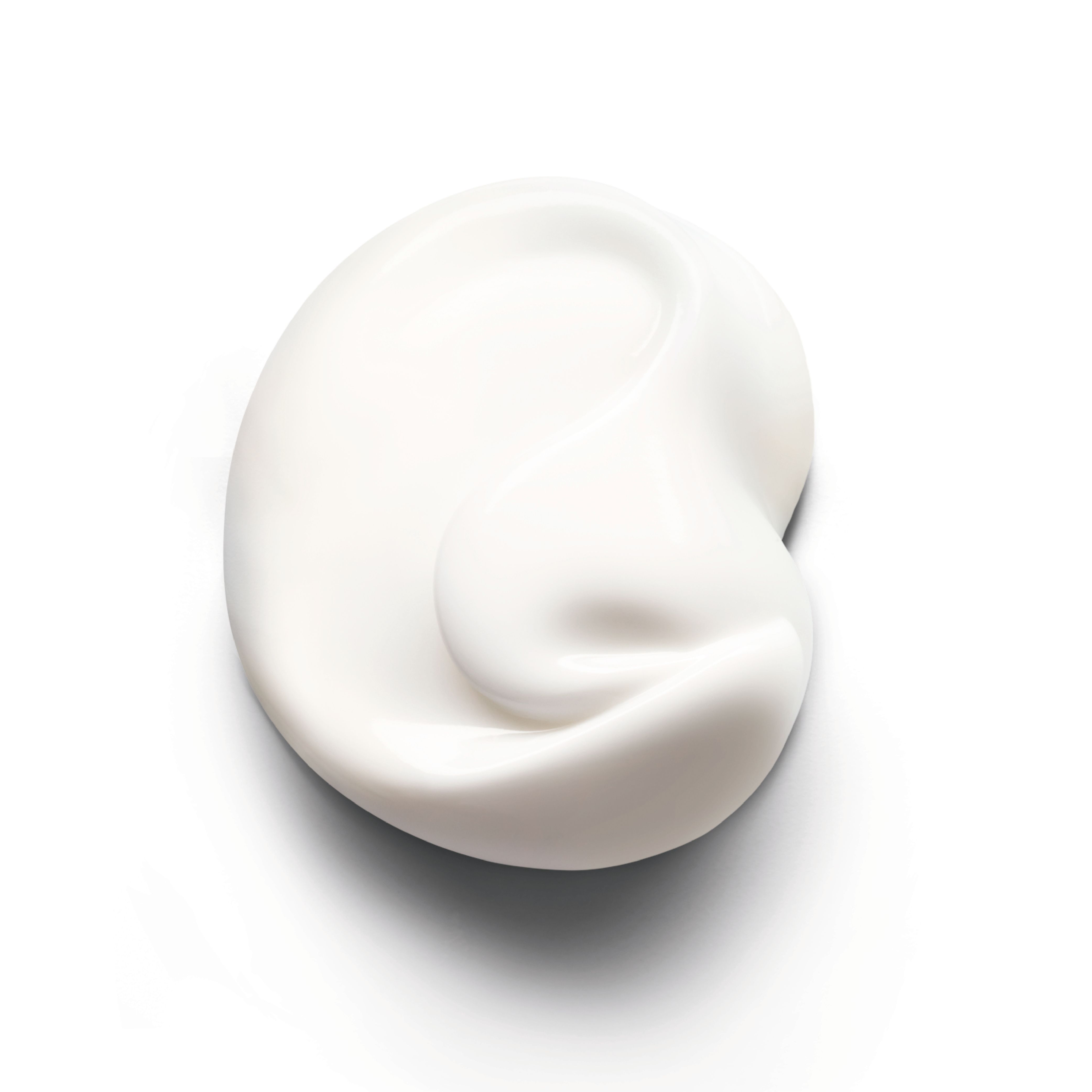 Macchia di crema bianca su sfondo bianco. Texture visibile.
