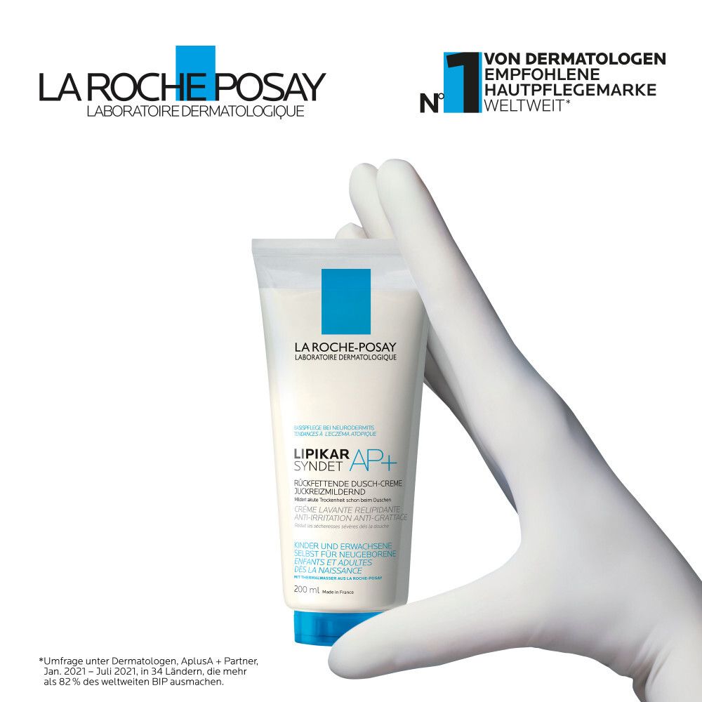 Guanto bianco tiene tubo Lipikar Syndet AP+. Testo: Raccomandato dai dermatologi. N.1 marchio cura della pelle.