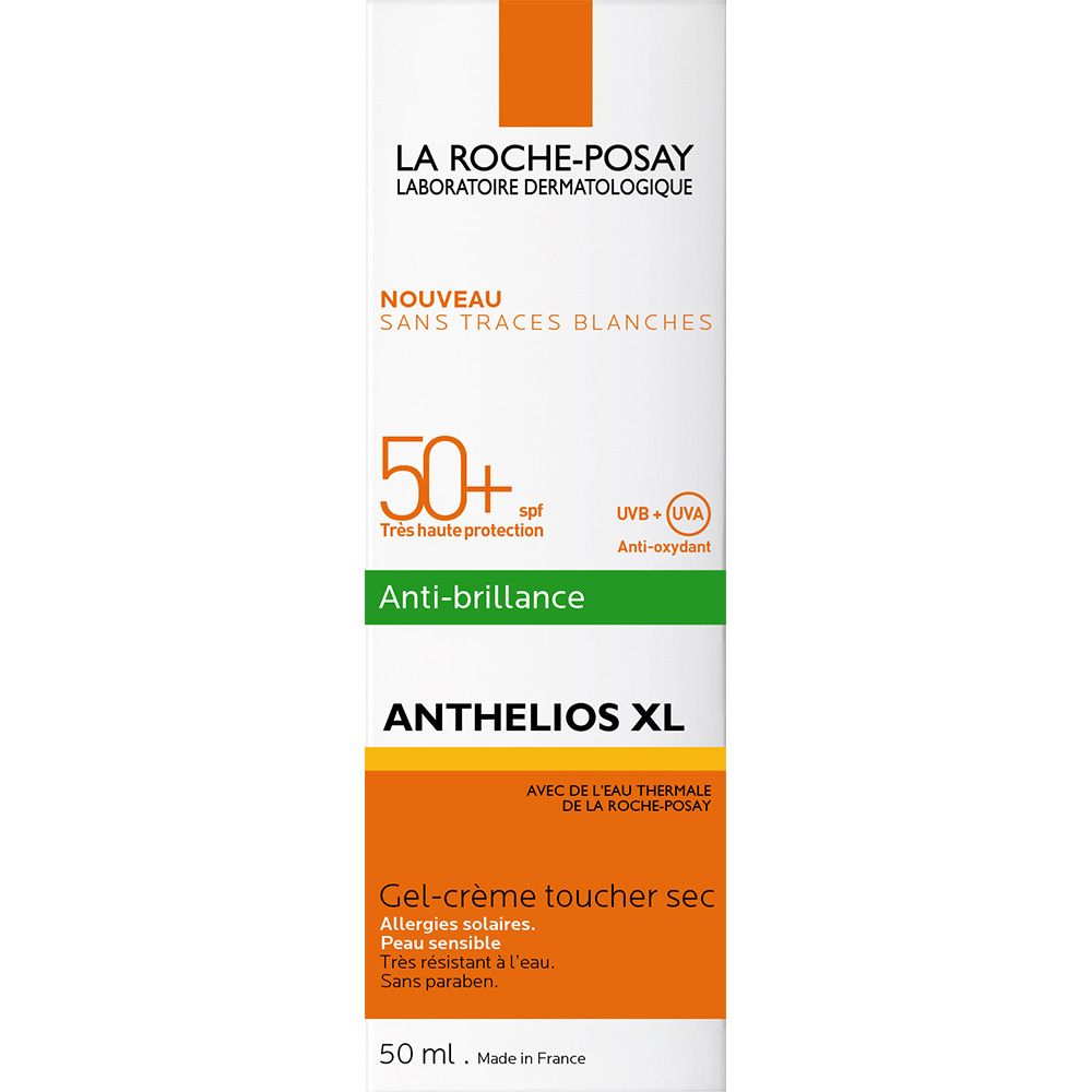 Tubo di crema solare, bianco, accenti arancioni e verdi. Testo: Anthelios XL 50+.