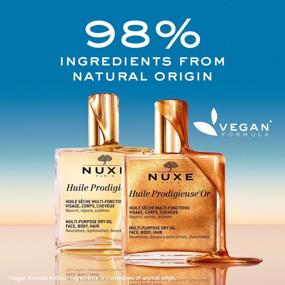 Due flaconi. Uno con liquido dorato. Testo: 98% ingredienti di origine naturale. Formula vegana.