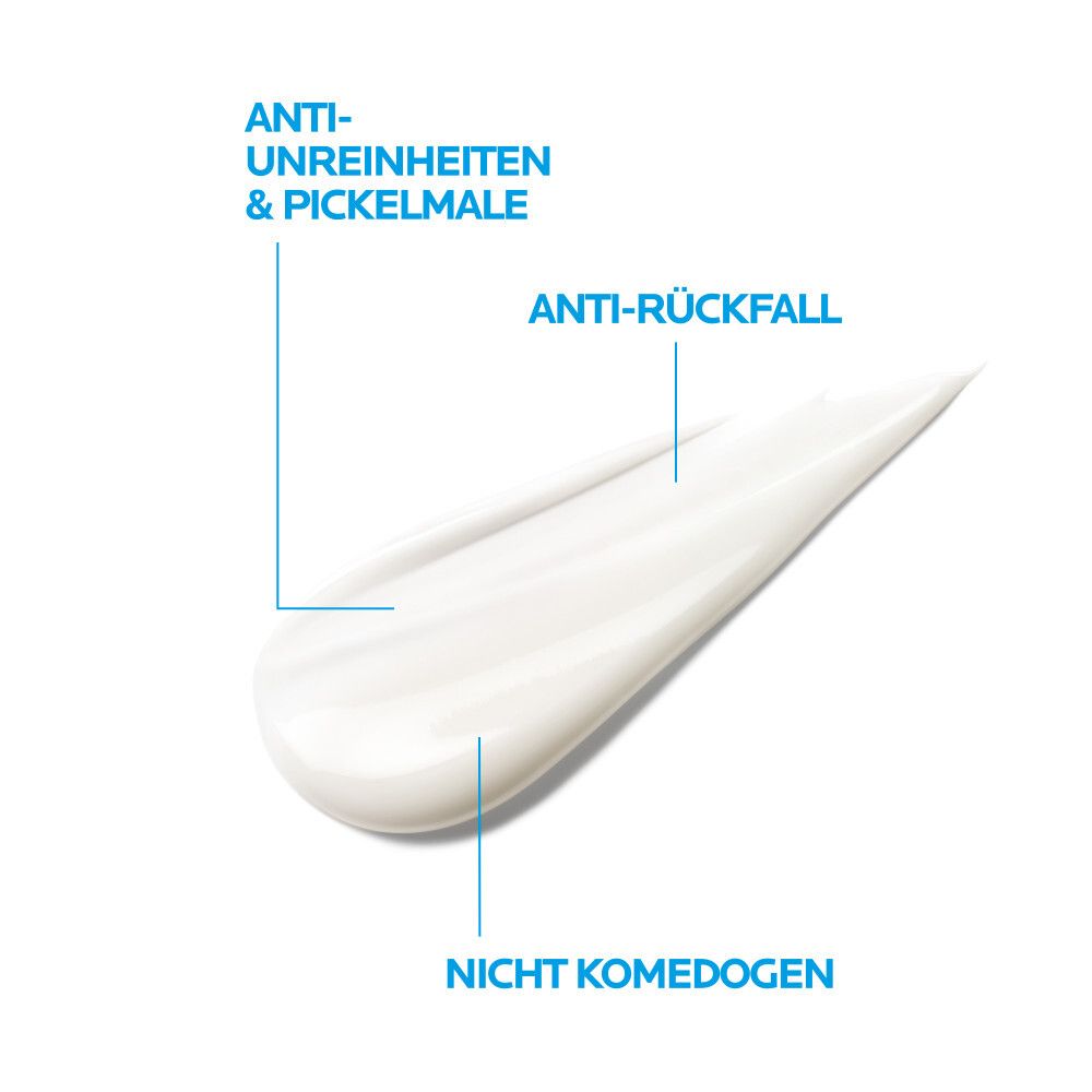 Tratto di crema bianca. Testo: Anti-imperfezioni e segni. Anti-ricaduta. Non comedogeno.