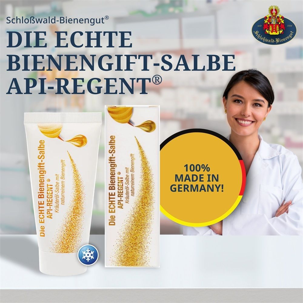 Tubo e scatola pieghevole di unguento al veleno d'api API-REGENT, accanto a una donna sorridente in camice, "100% MADE IN GERMANY".