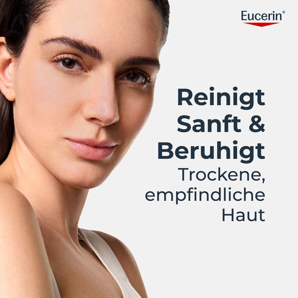 Donna che tiene una saponetta Eucerin pH5 senza sapone. Proprietà: Sapone per pulizia quotidiana, protegge il microbioma cutaneo, per pelli stressate da allergie.