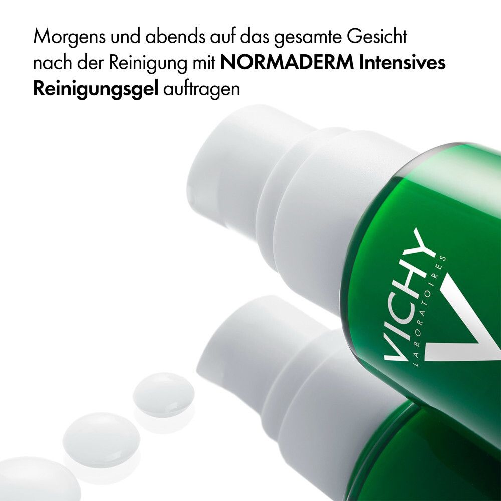 Flacone verde Vichy con erogatore bianco e gocce di gel detergente.