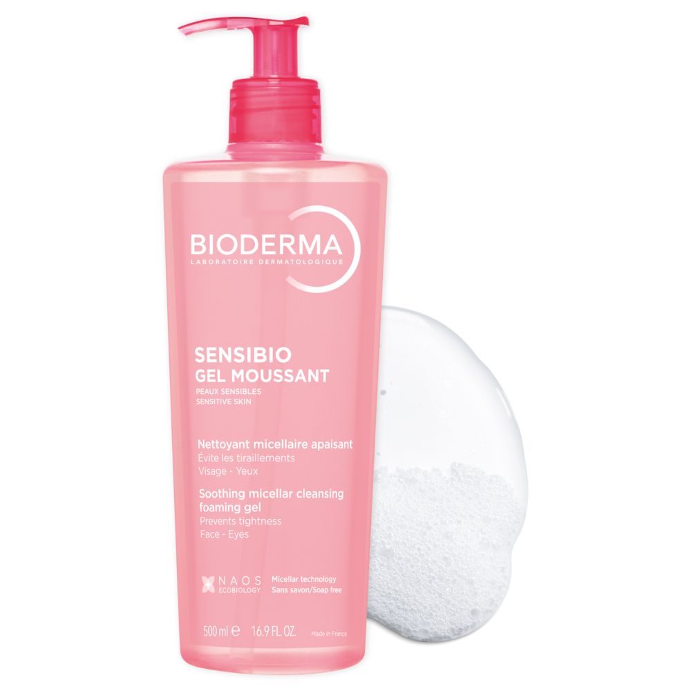 Flacone rosa con pompa e gel detergente. Retro con informazioni sul prodotto e codice a barre.