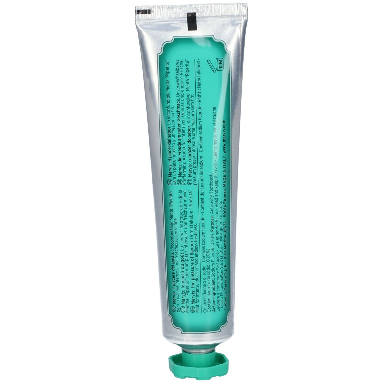 Retro del tubetto di dentifricio. Testo multilingue. Contenuto verde visibile. Tappo verde.