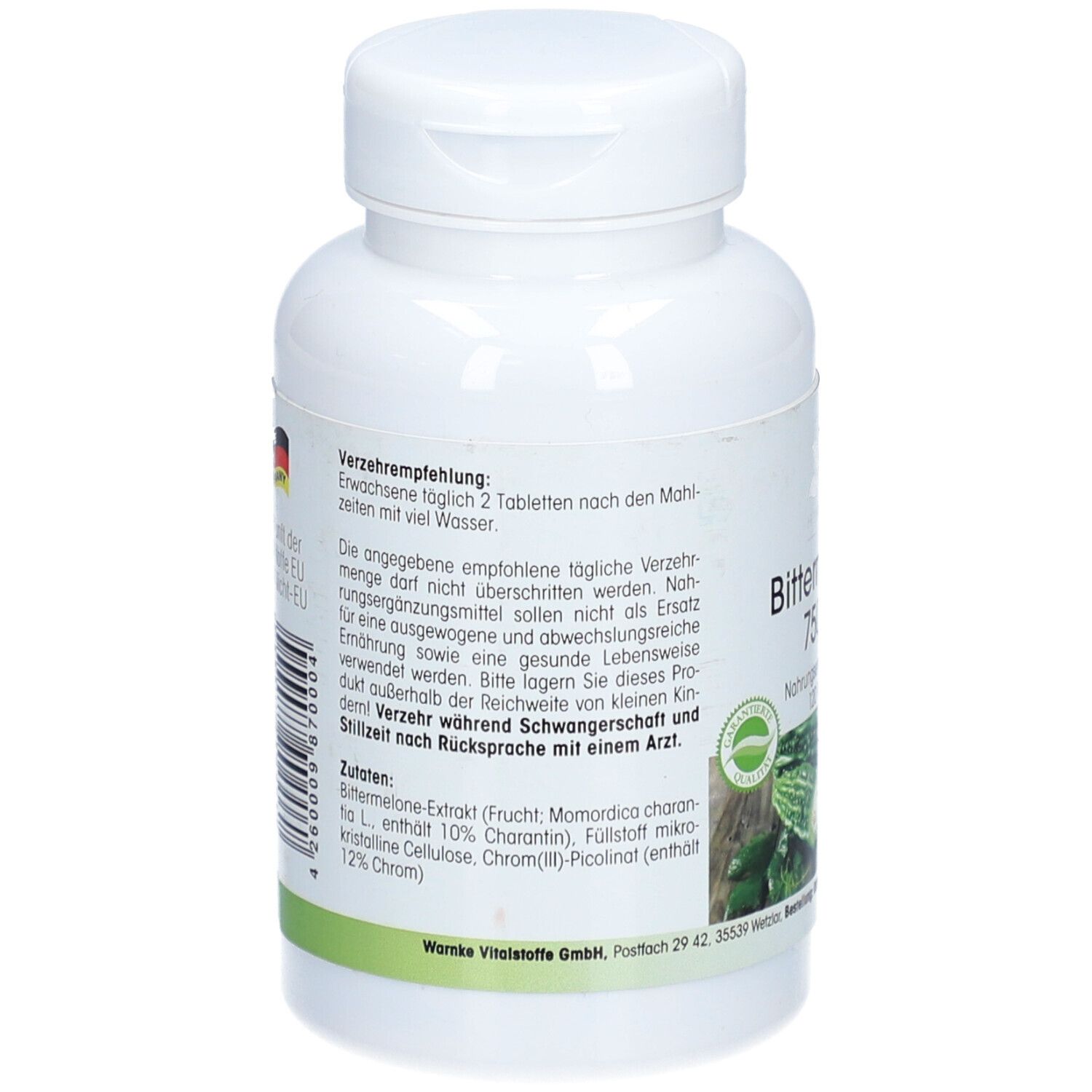 Retro del flacone di compresse bianco. Testo: Raccomandazioni per l'uso, ingredienti. Illustrazione del melone amaro. Prodotto in Germania.