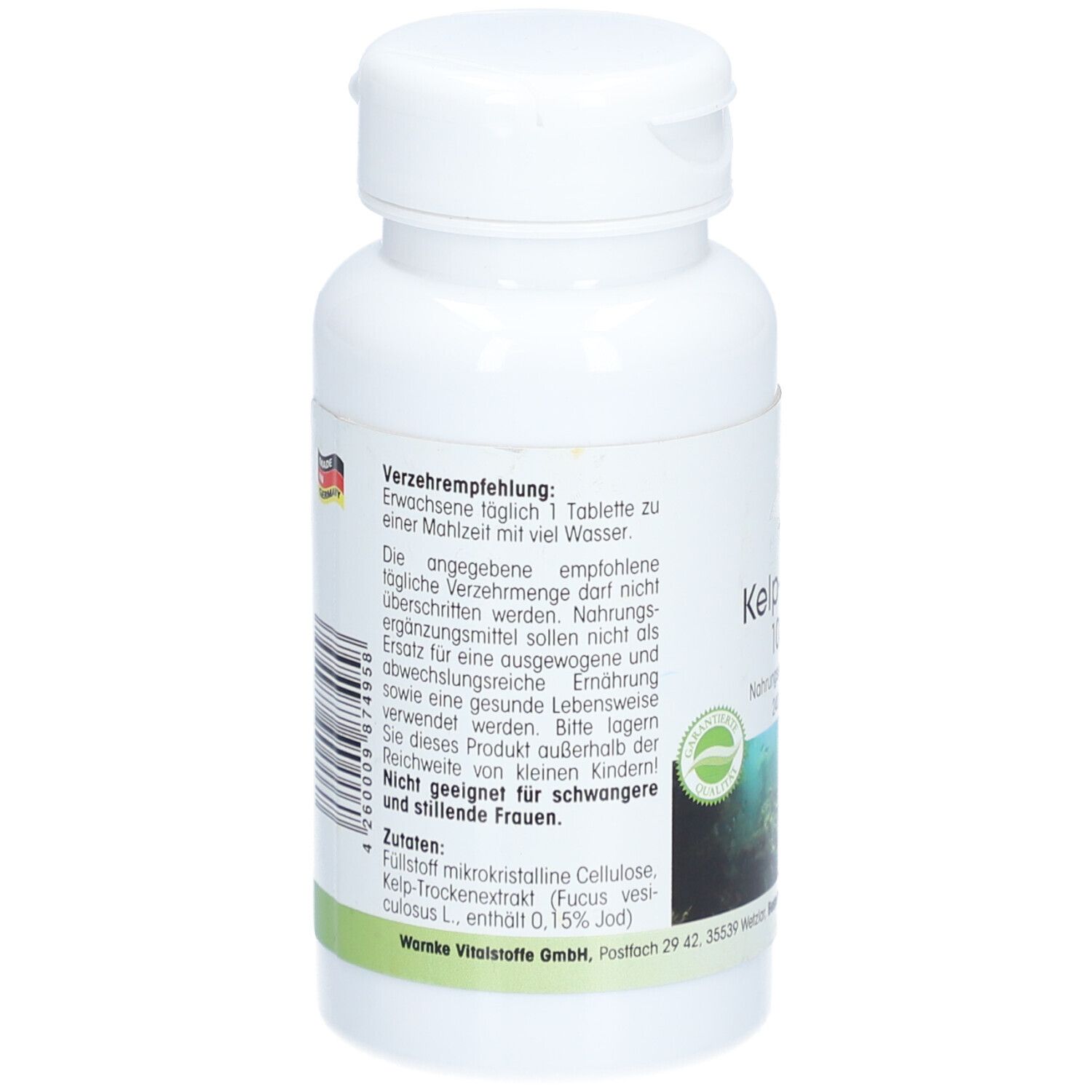 Retro del flacone bianco. Testo con raccomandazioni, ingredienti e avvertenze. Etichetta verde con logo.