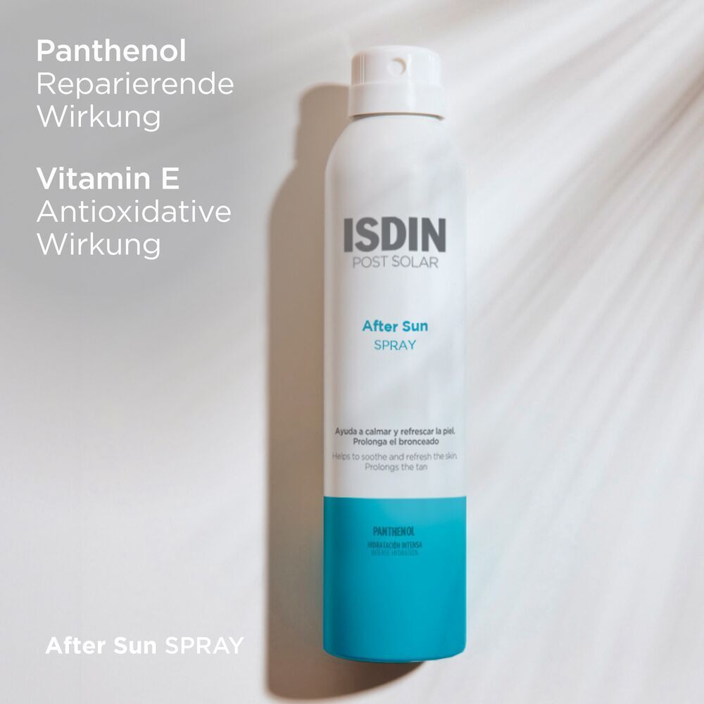 Flacone spray bianco. ISDIN Post Solar After Sun Spray. Testo: Pantenolo, Vitamina E.