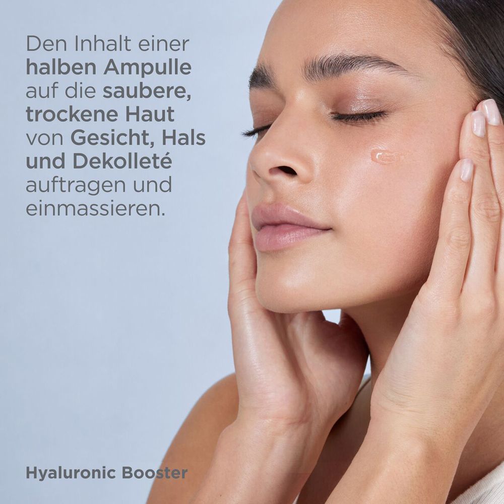 Donna applica siero ISDINCEUTICS Hyaluronic Booster. Testo: Massaggiare viso, collo, décolleté.