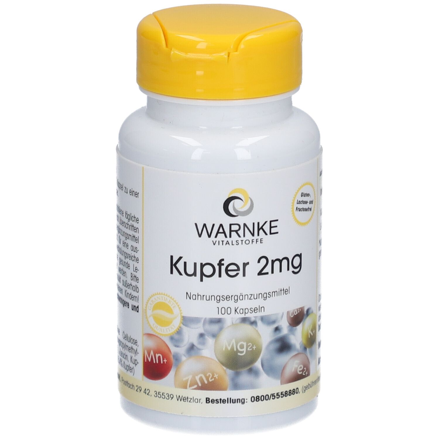 Flacone bianco con tappo giallo. Scritta: Warnke Vitalstoffe Kupfer 2mg. Integratore alimentare. 100 capsule. Contiene minerali.
