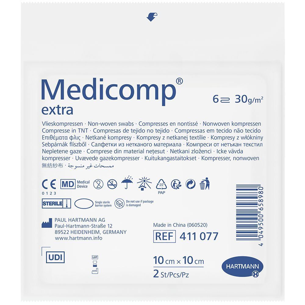 Confezione di compresse Medicomp extra. 10x10cm, 2 pezzi. Marchio CE, sterile. Logo Hartmann.