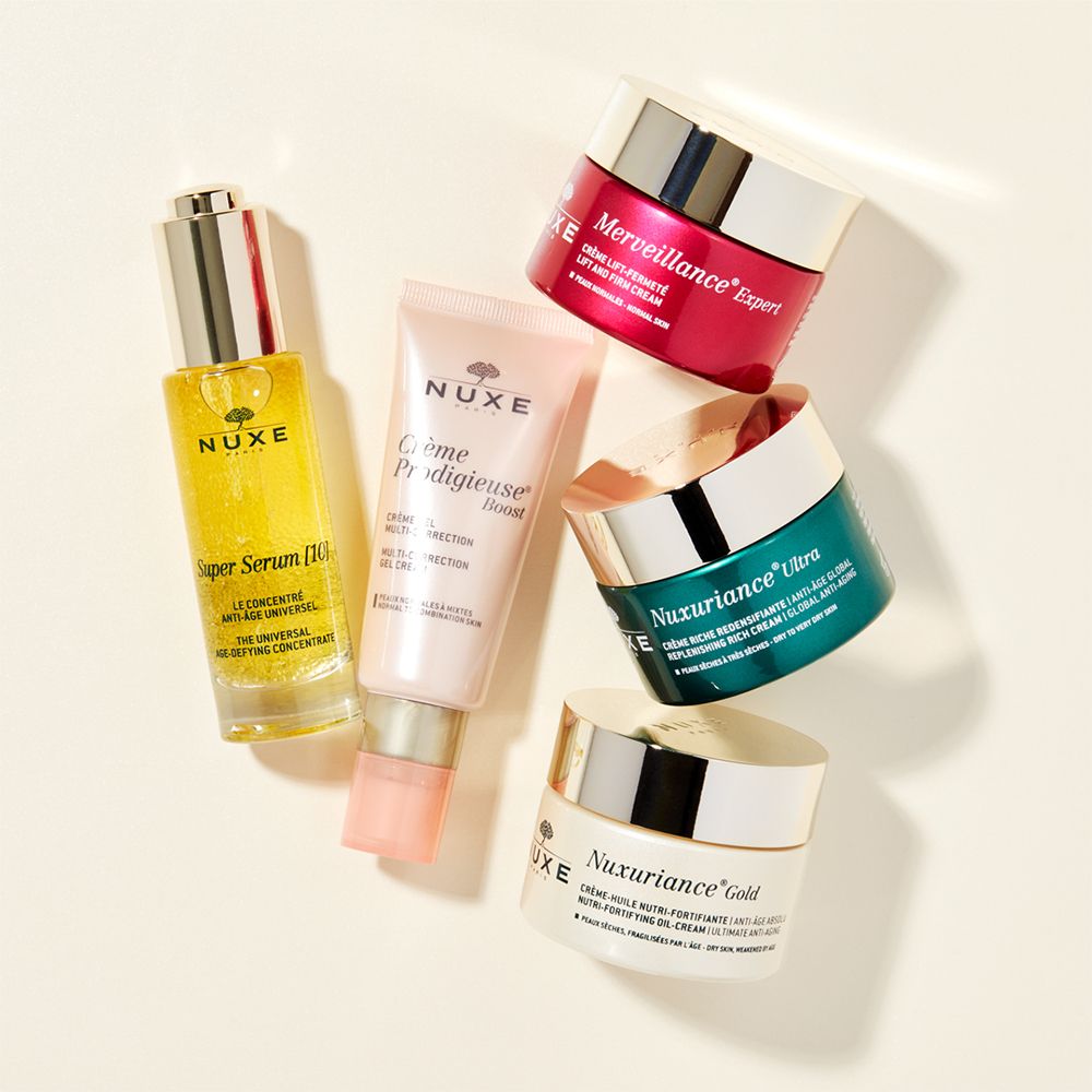 Vari prodotti NUXE: siero, crema e altre creme. Scritte visibili.