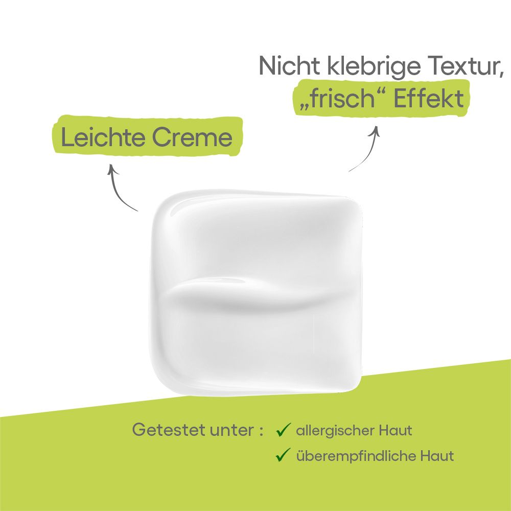 Crema bianca su una superficie. Testo: Crema leggera, texture non appiccicosa, effetto fresco. Testato per pelli allergiche e sensibili.