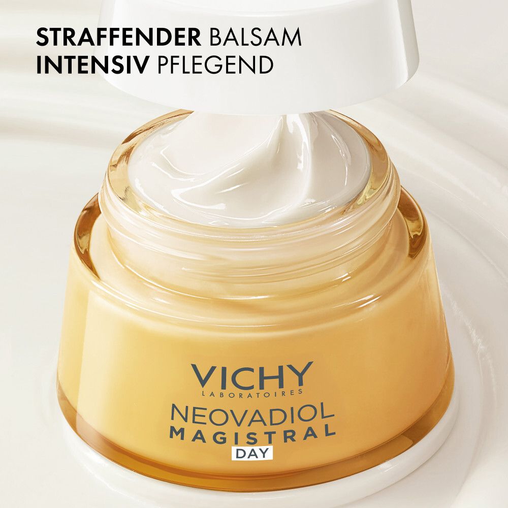 Primo piano di un barattolo aperto di Vichy Neovadiol Magistral Giorno con crema ricca. Testo: 'Balsamo rassodante, cura intensiva.'