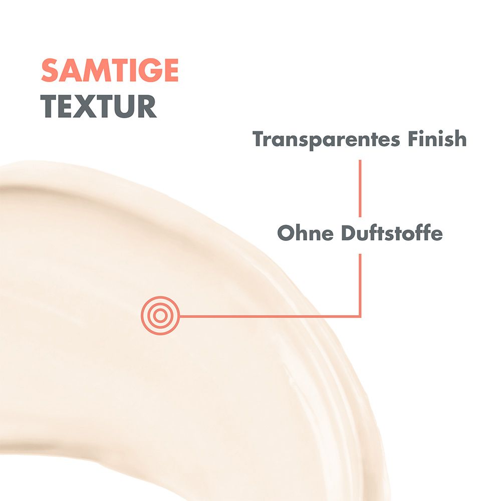 Primo piano della crema solare. Testo: Texture vellutata, finitura trasparente, senza profumo. Cerchio rosso.