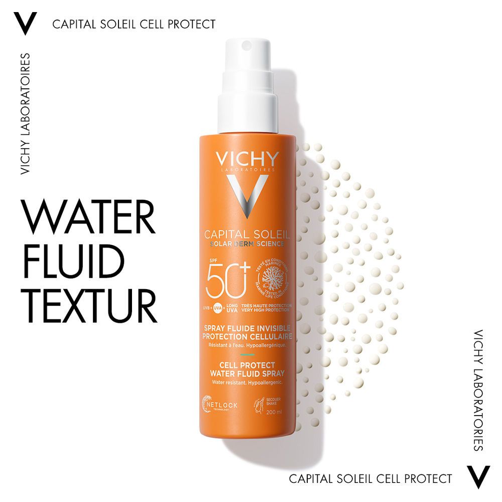 Donna che spruzza protezione solare. Testo: Invisibile sulla pelle. Vichy Capital Soleil Cell Protect.