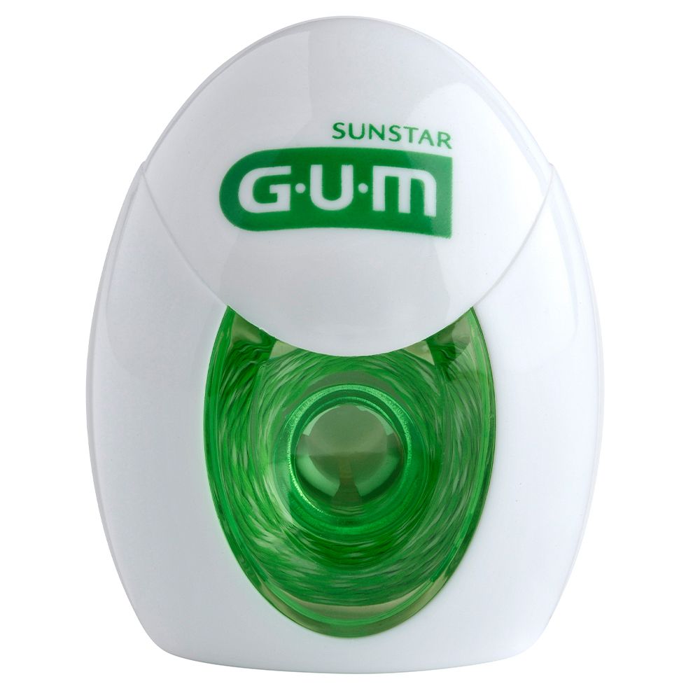 Bobina di filo interdentale GUM®. Alloggiamento bianco con anima verde. Scritta: SUNSTAR, GUM. Filo interdentale visibile.