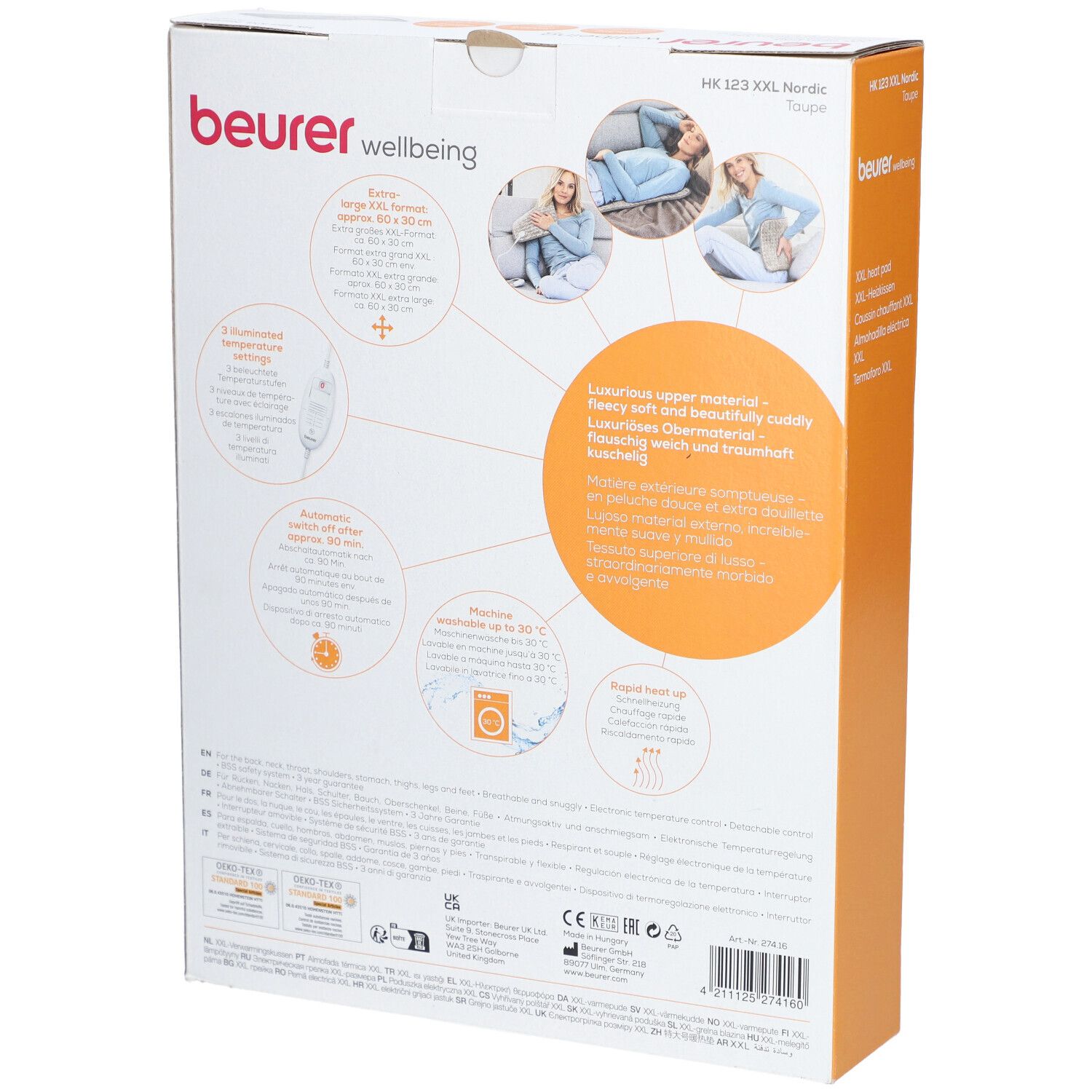 Retro della confezione del prodotto. Cuscino riscaldante Beurer HK 123 XXL Nordic. Testo e pittogrammi. Immagine: cuscino riscaldante, donna. Testo: Wellbeing, German Engineering.