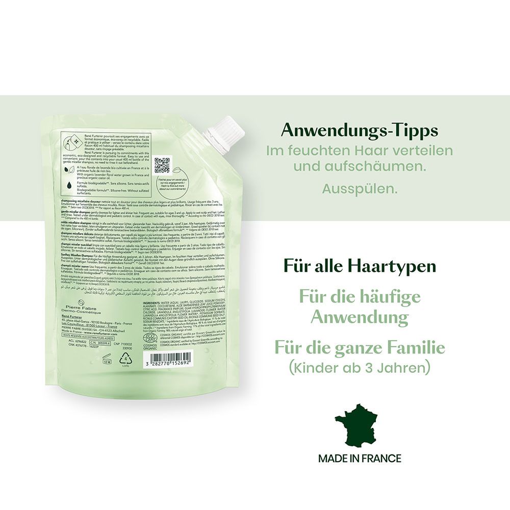 Bustina di ricarica per shampoo, verde chiaro, con tappo a vite. Contiene consigli d'uso e informazioni sul prodotto.