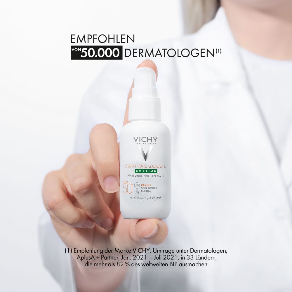 Primo piano degli ingredienti. Testo: Niacinamide, acido salicilico. Liquidi e bolle verdi.