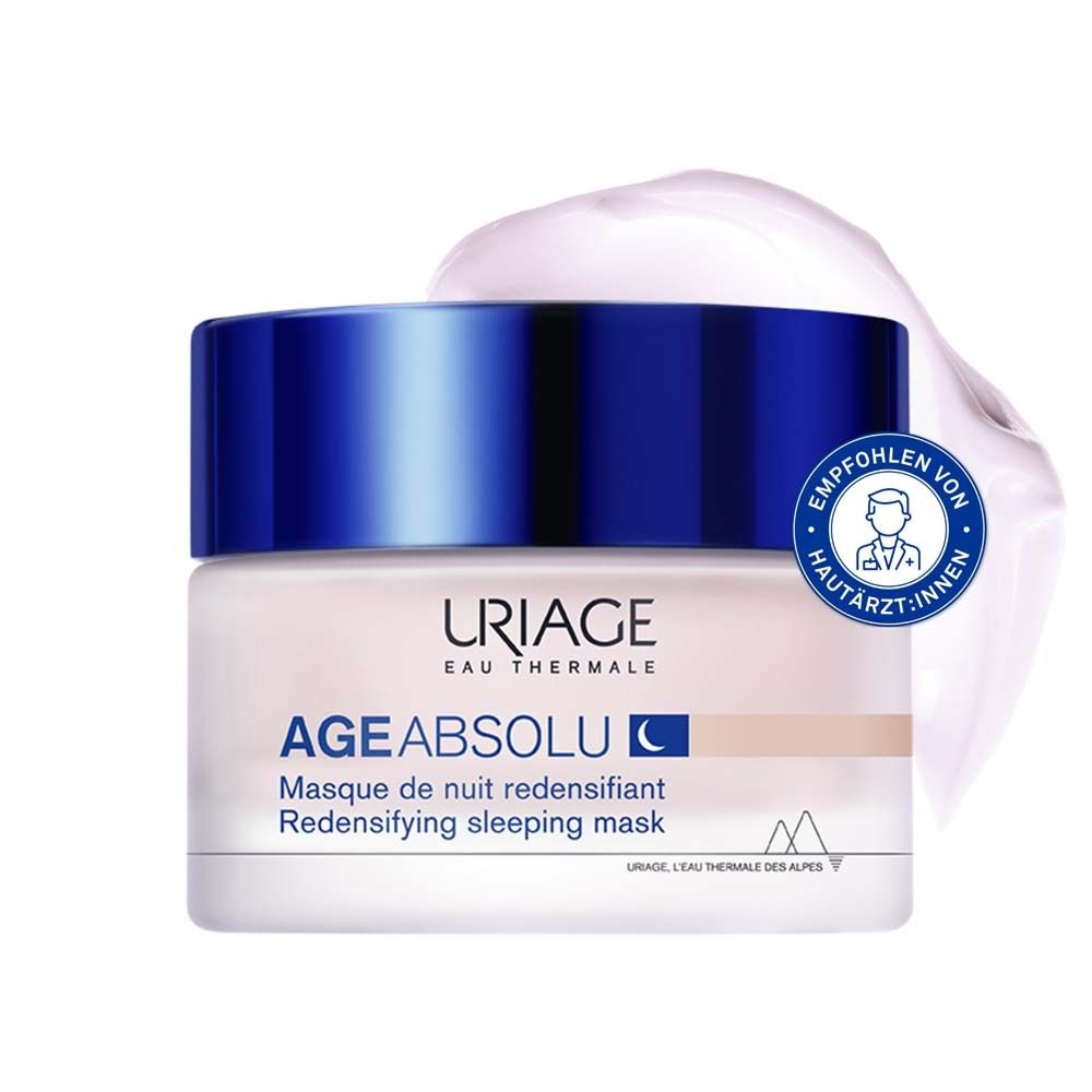 Vaso di crema con coperchio blu. Scritta: URIAGE AGE ABSOLU, maschera notte. Crema sul coperchio.