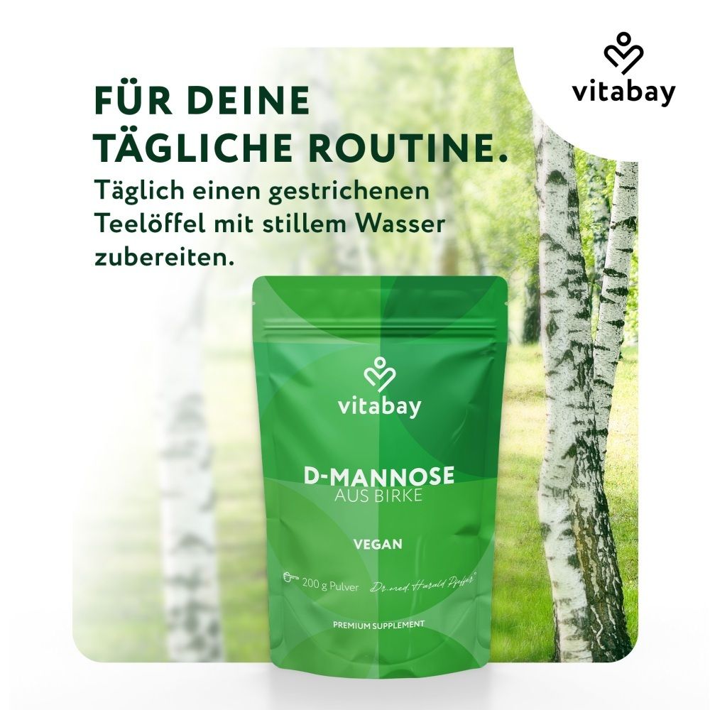Sacchetto Vitabay D-Mannosio da betulla davanti a un bosco di betulle, per la routine quotidiana.